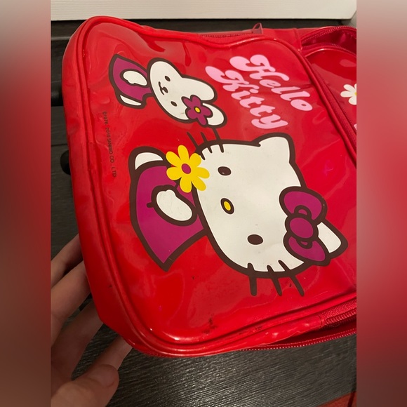 Hello Kitty 12” tall suitcase with wheels. - Picture 7 of 12